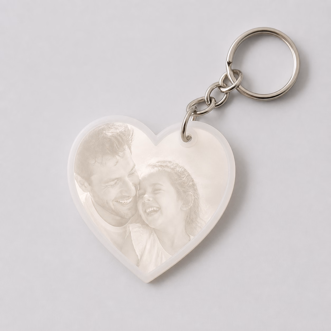 A complete Nimelle Heart glowing with a father-and-daughter photograph.